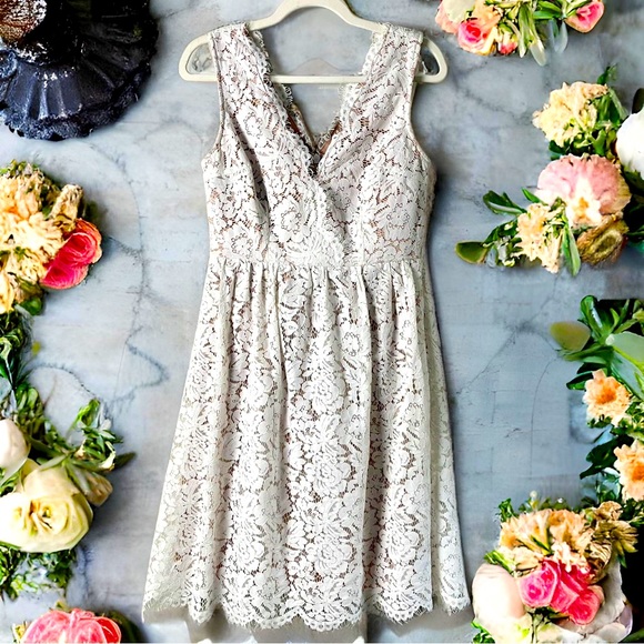 love swept white lace midi skater dress Love Swept White Sleeveless Lace High-Low Midi Dress Dressystar